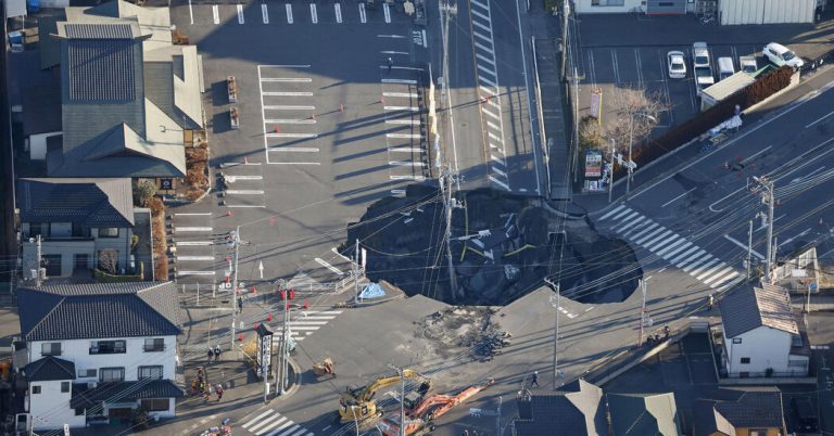 Rescuers in Japan try to get to the driver trapped in Sinkhole for days