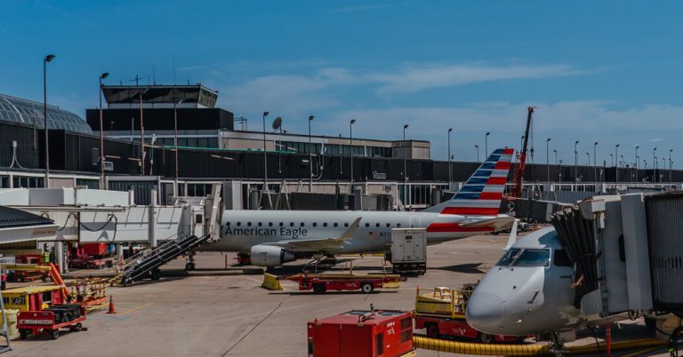 Plane and aircraft trailer collide in Chicago, critically injuring the driver